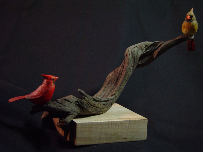 Carved songbird, first glance
