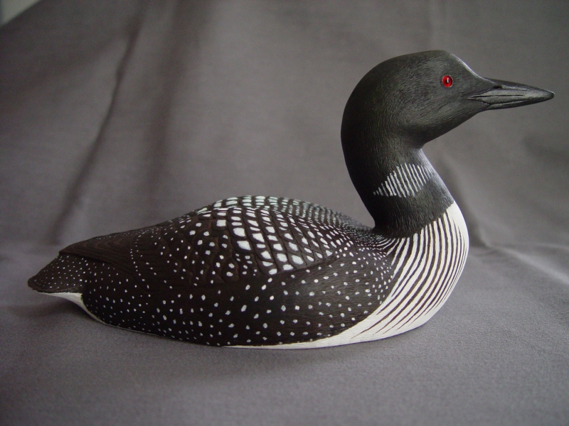 Carved loon in profile