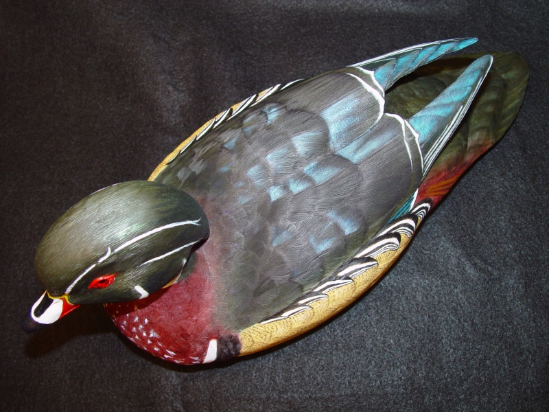 Carved wood duck seen from above